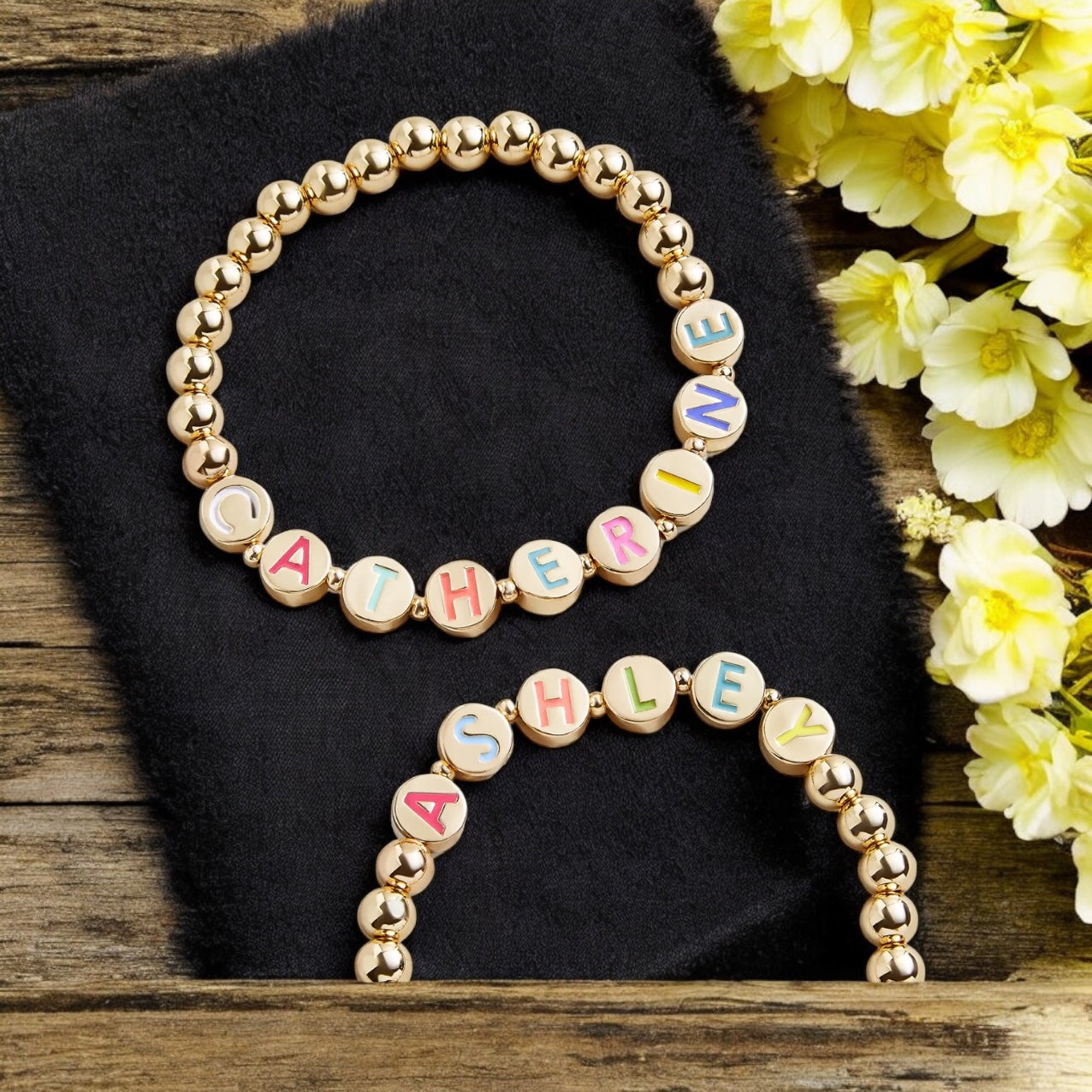 Gold beaded bracelet with word